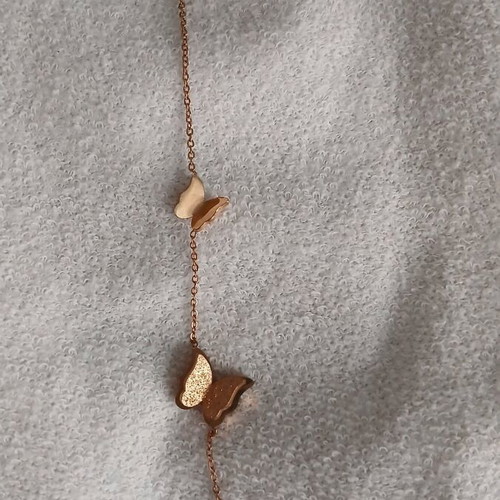 Steel chain bracelet used with 3 butterflies pink gold color