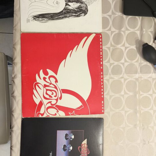 Vinyl records used, pack of about 75 with classic rock artists