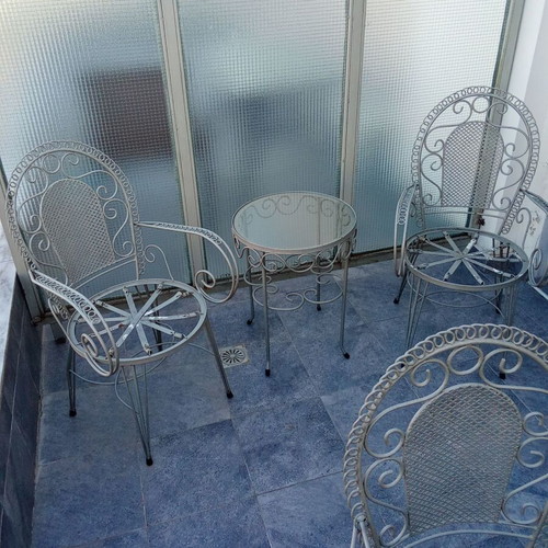 Fer Forge garden sofa set like new with chairs, tables, and two-seater couch