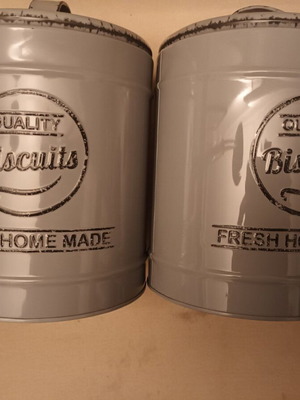 Set of two collectible metal Quality Biscuits cookie tins like new