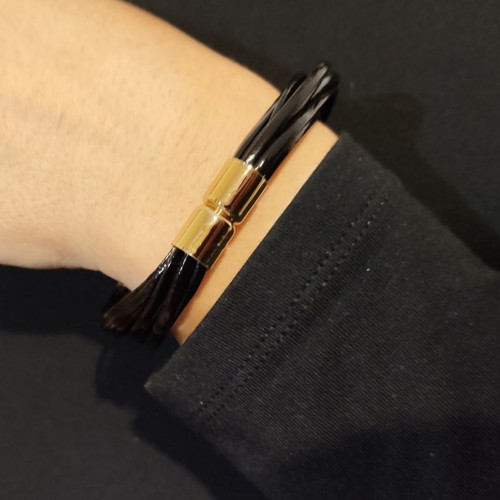 Bracelet new in black and gold with magnetic clasp