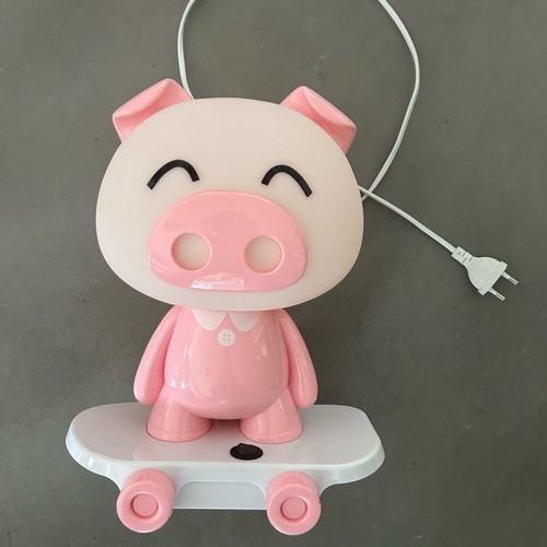 Pig Lamp with Skateboard like new