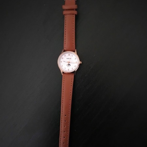 Quartz women's watch new, brown
