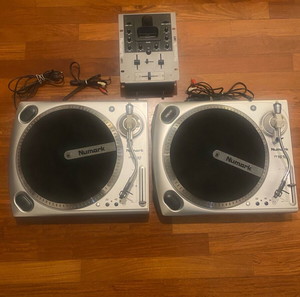 2 Numark TT1610 turntables,  Numark iM1 2 channel DJ mixer with iPod dock