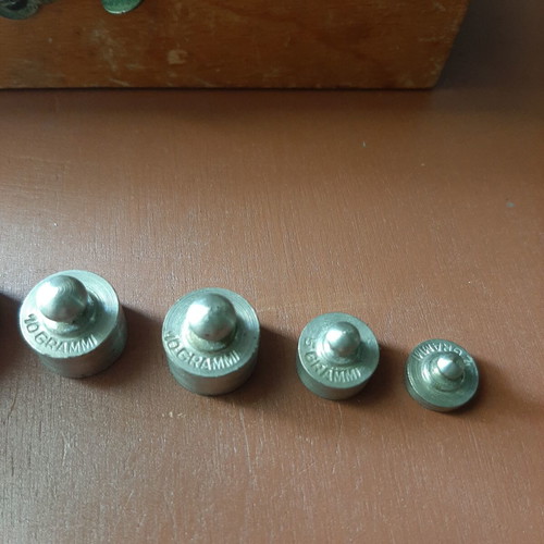 Wooden collectible box with cast iron weights