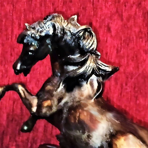 Bronze horse on wooden base like new