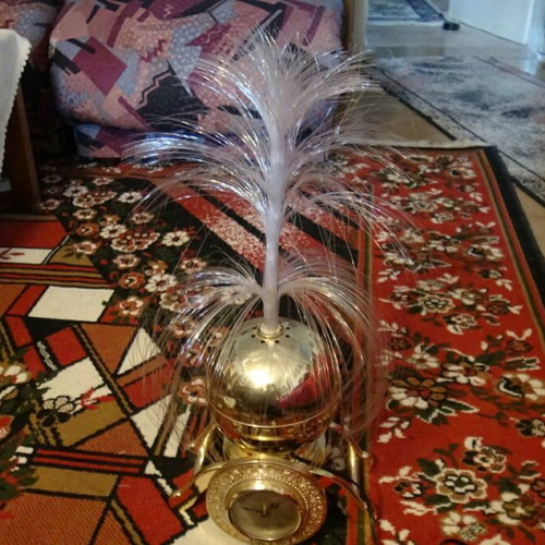 Collectible clock like new with lighting and rotating solinas