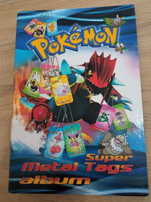 Pokemon album binder for metal tags used
