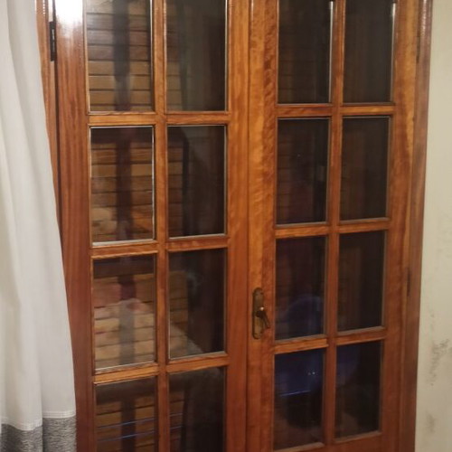 Wooden window frames used, solid mahogany with double glass