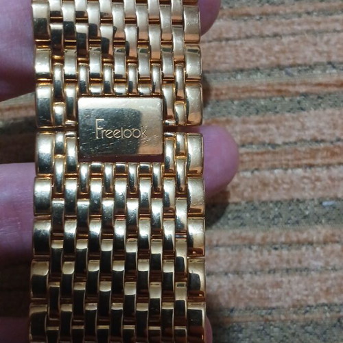 Freelook HA1044G/9 women's watch used, gold color