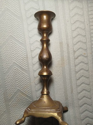 Brass vintage candlestick used with natural oxidation
