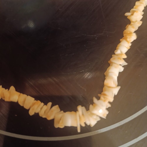 Pooka shell necklace vintage, like new, natural shell fragments light shade