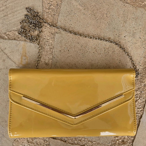 Aldo yellow vinyl clutch bag used with gold trim