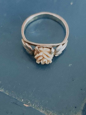 Silver ring with coral used