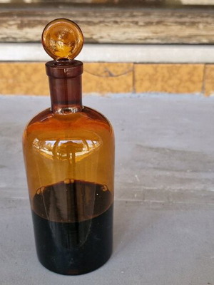Vintage glass pharmacy bottle used