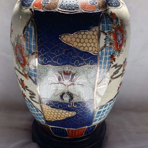 Satsuma porcelain vase with wooden base