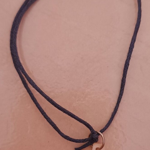 Bracelet with cross like new, black and blue