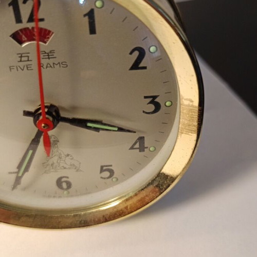 Five Rams table clock used, analog