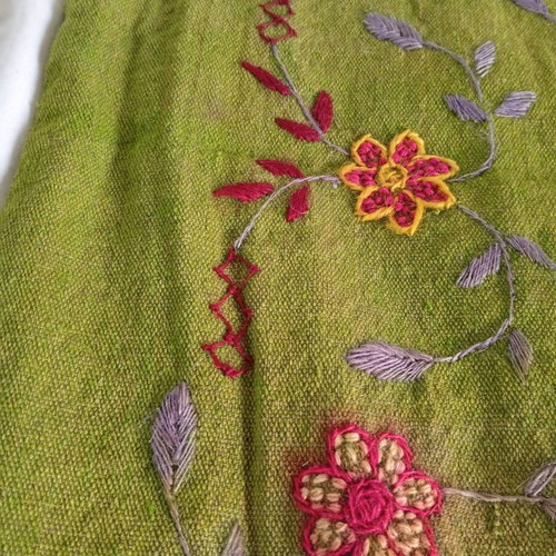 Embroidered green pillowcase used with details