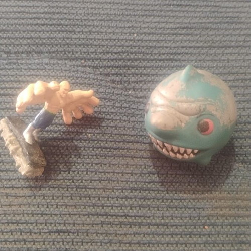 Collectible toy figures with wear, set of 2