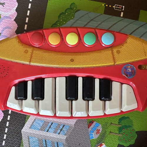 Children's piano used with multiple sound buttons