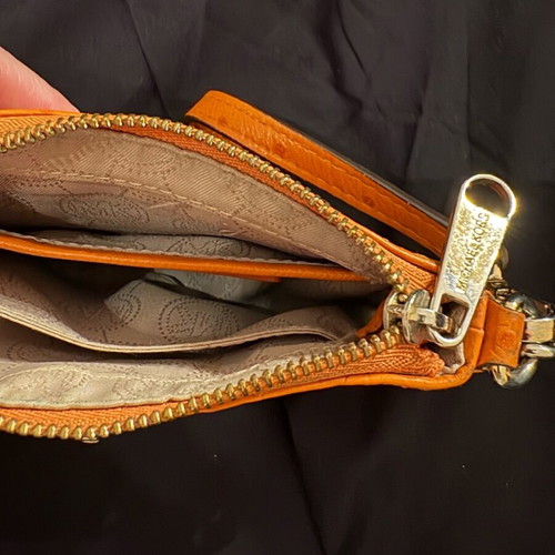 Michael Kors mini leather wallet used orange