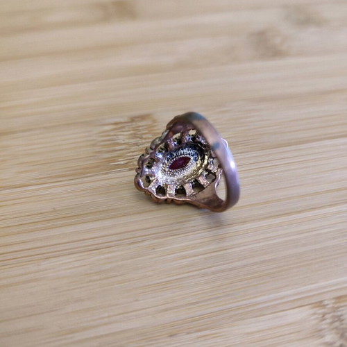 Vintage ring with red stone used