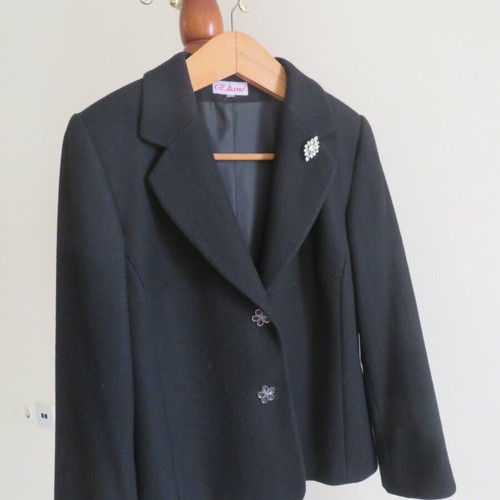 Women's black jacket like new, size GR 56