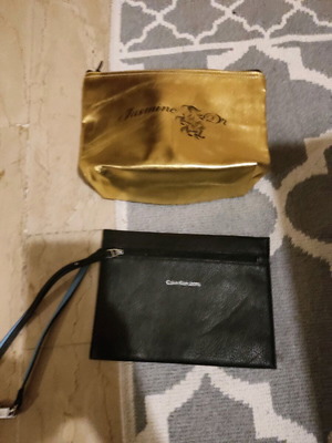 2 women's bags-necessers like new, one Calvin Klein