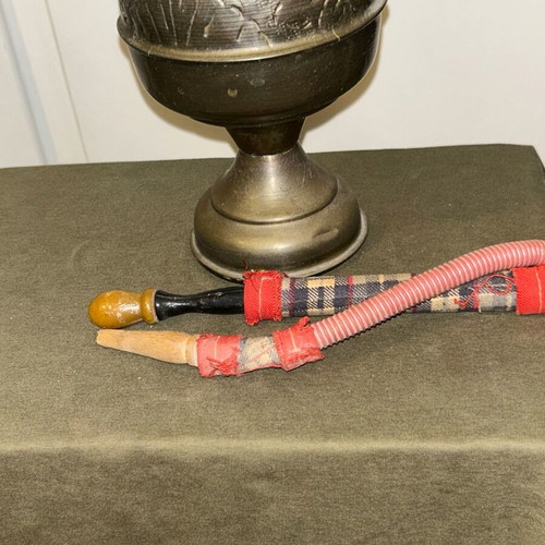 Vintage brass decorative hookah with embossed designs, used