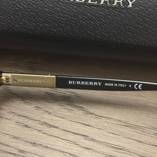 Burberry sunglasses like new, black and gold