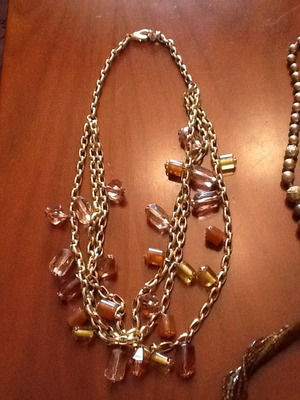 Necklace with three chain rows new, brown and gold