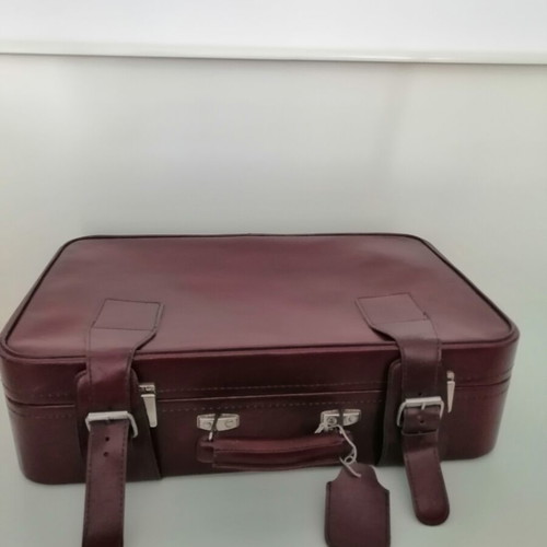 Vintage suitcase used, burgundy color, 1970s with metal clasps