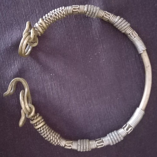 Collectible African necklace used, made of hard metal