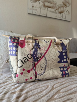 Avon shoulder bag like new, beige multicolor