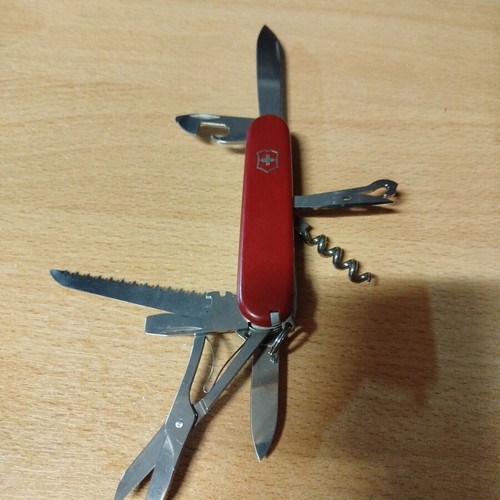 Leatherman Sidekick, Victorinox Swiss, and Opinel No6 knives like new