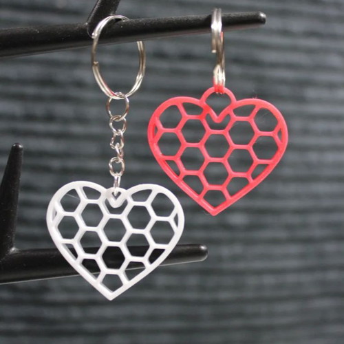 Heart keychain new, available in white and pink