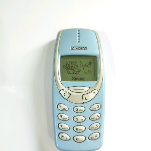Nokia 3310 Classic Phone Turquoise used with brick buttons and charger