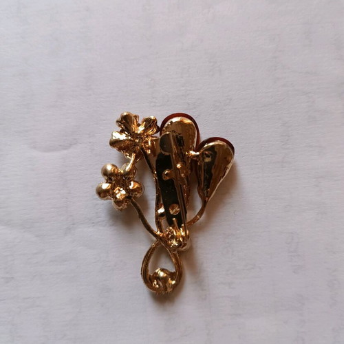 Women's pin new in gold tone