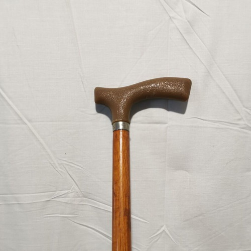 Walking cane light brown used