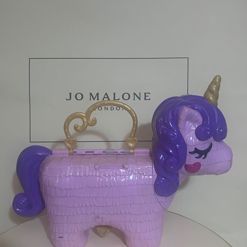 Polly Pocket Unicorn Party Playset used by Mattel