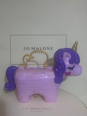 Polly Pocket Unicorn Party Playset used by Mattel