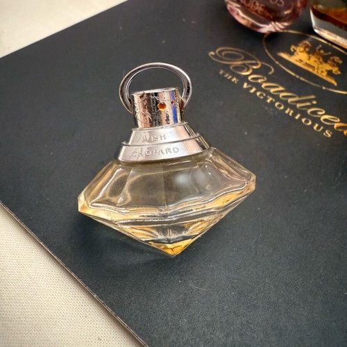 Collection of 11 authentic miniature perfumes like new