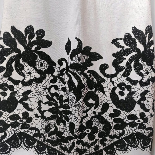 Mini dress like new, black and white with decorative buttons