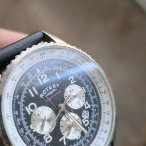 Rotary watch used, black and white colors