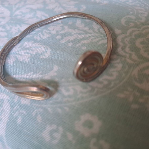 Ethnic bracelet used, silver color, small size with spiral design