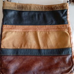 Crossbody bag made of suede used with signs of wear