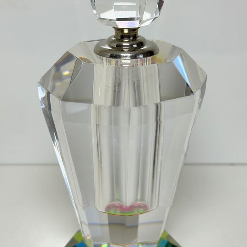 Vintage faceted crystal perfume bottle with iridescent prism base