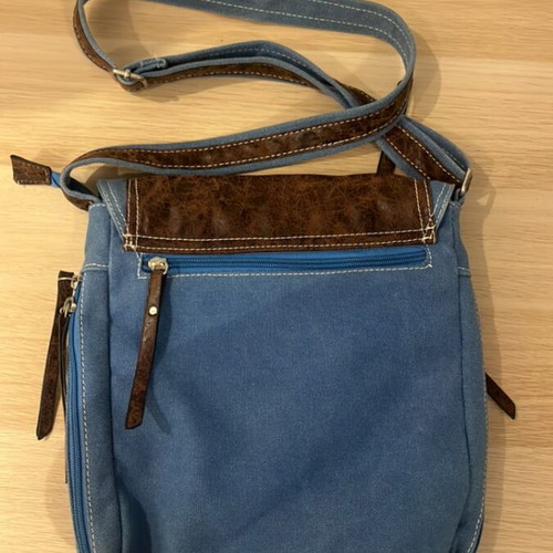 Denim and brown crossbody shoulder bag with sneaker details