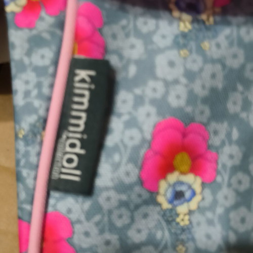 Kimmidol crossbody bag used, multicolor, missing one flower